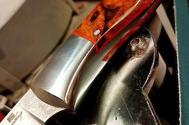 416 bolsters and red liners over a taprred tang