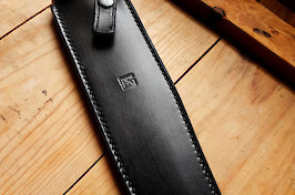 Dressed a a full-grain leather sheath