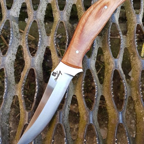 Convex ground trailing point hunter in 14C28N and Permali densified wood.